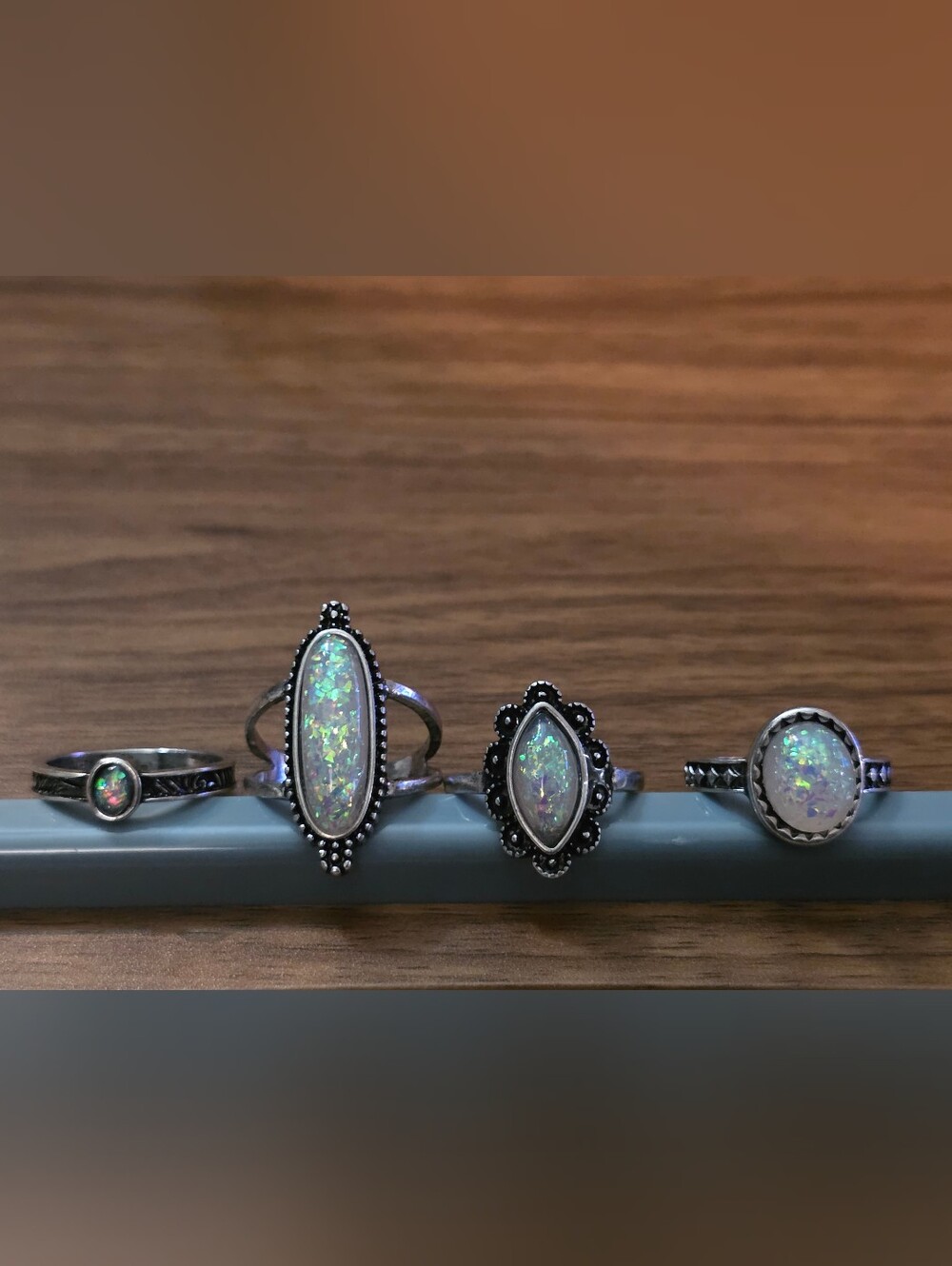 4 Opal-style Rings in Iridescent White